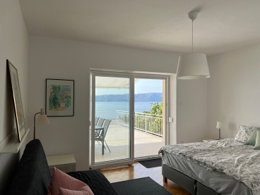 Master bedroom in the lower apartment with a stunning view
